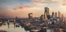 The skyline of London city with Tower Bridge and financial district skyscrapers during sunrise, England, United Kingdom